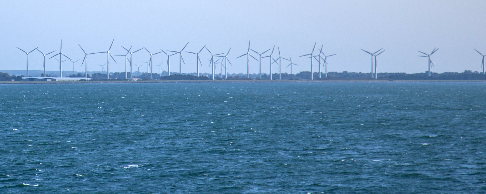 Windmills along  a coast