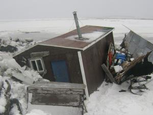 Ice damage to a camp near Golovin, Alaska