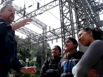 Man explaining something to group of people