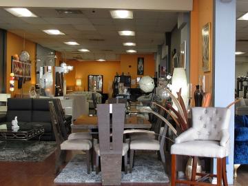 Jumble of chairs, tables, and lamps