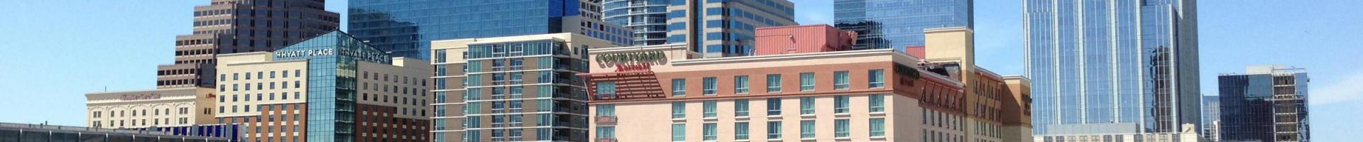 concrete buildings under blue sky