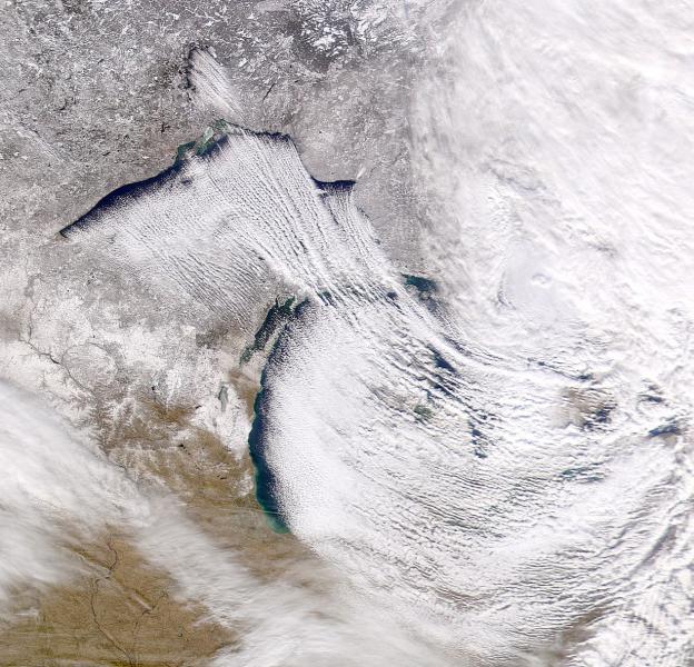 Satellite view of clouds streaming off the Great Lakes