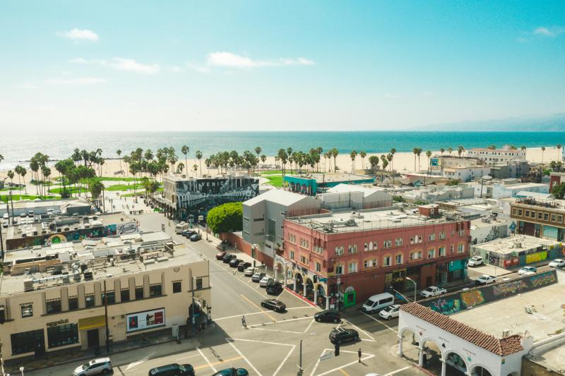 aerial view of concrete buildings near ocean