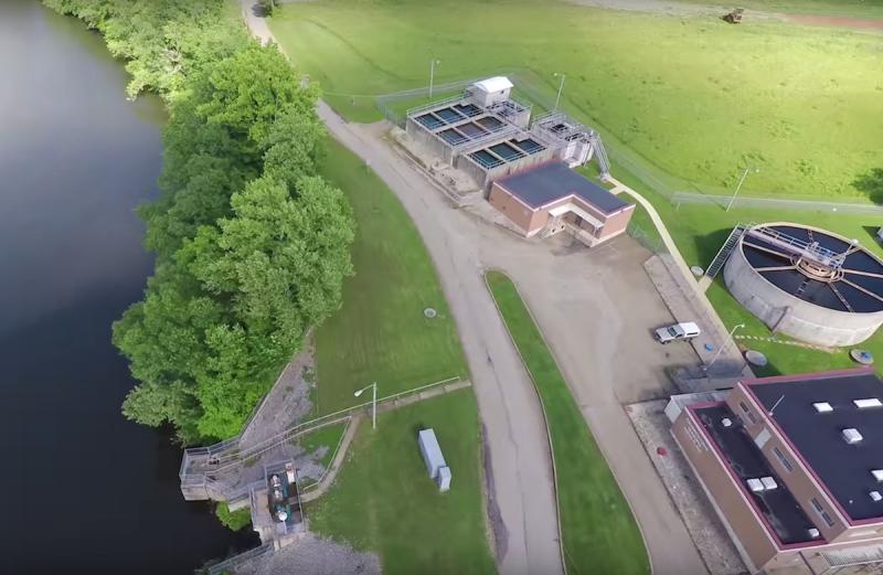 Aerial view of river and water treatment plant