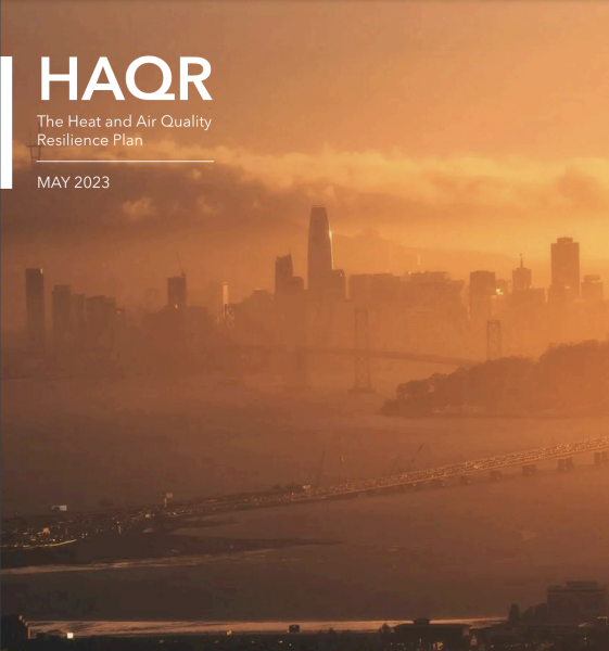 Report cover with hazy orange smoke across a large cityscape