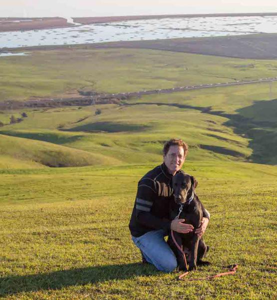 Photo of Julian Meisler with dog