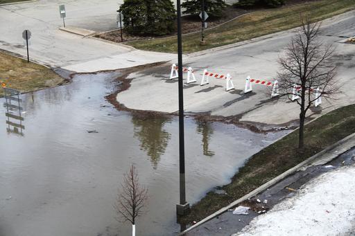 Roadway damaged by flooding on the Red River in Minnesota.