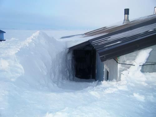 Photo of the effects of a 2009 three-day snowstorm in Kivalina, Alaska