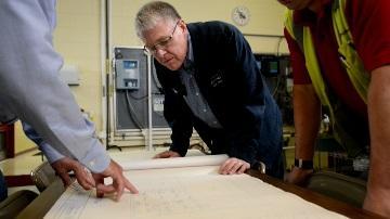 Chris Wiesmann and staff plan flood mitigation efforts.
