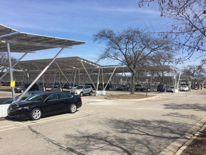A parking lot with solar charging stations on the Michigan State University campus